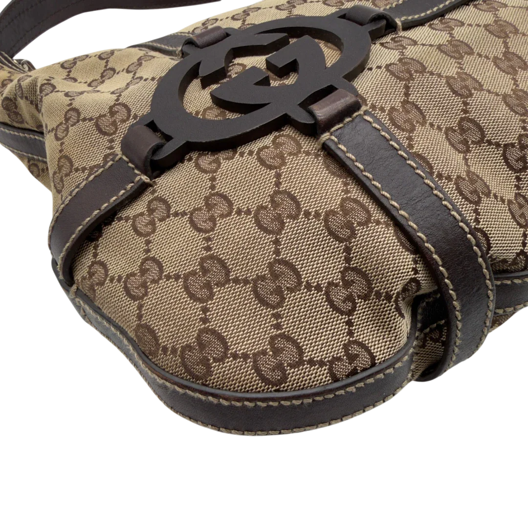 https://cdn.shopify.com/s/files/1/0564/9376/8855/files/Gucci_Schultertasche_Royal_Hobo_monogram_beige_7.webp?v=1782908724