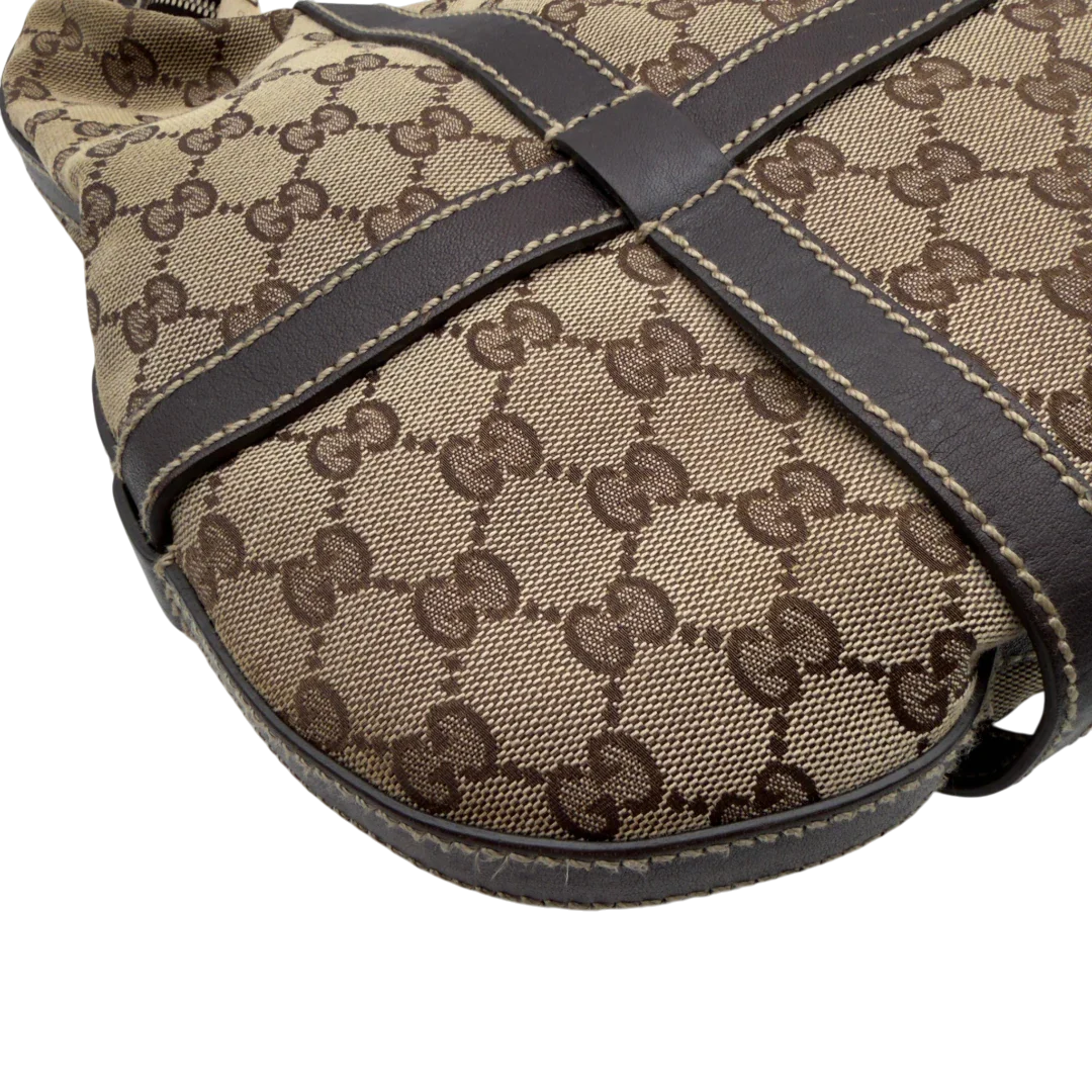 https://cdn.shopify.com/s/files/1/0564/9376/8855/files/Gucci_Schultertasche_Royal_Hobo_monogram_beige_9.webp?v=1782908724