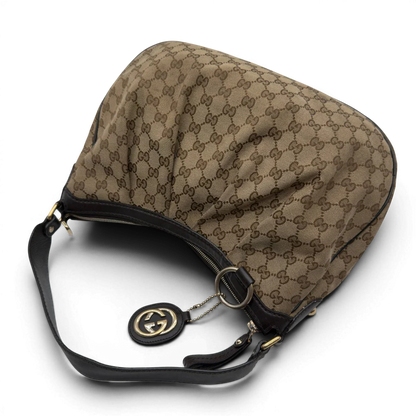 https://cdn.shopify.com/s/files/1/0564/9376/8855/files/Gucci_Schultertasche_Sukey_One_monogram_beige_10_98a50044-fdd8-4dc2-af90-0e201af05bb1.webp?v=1782906749