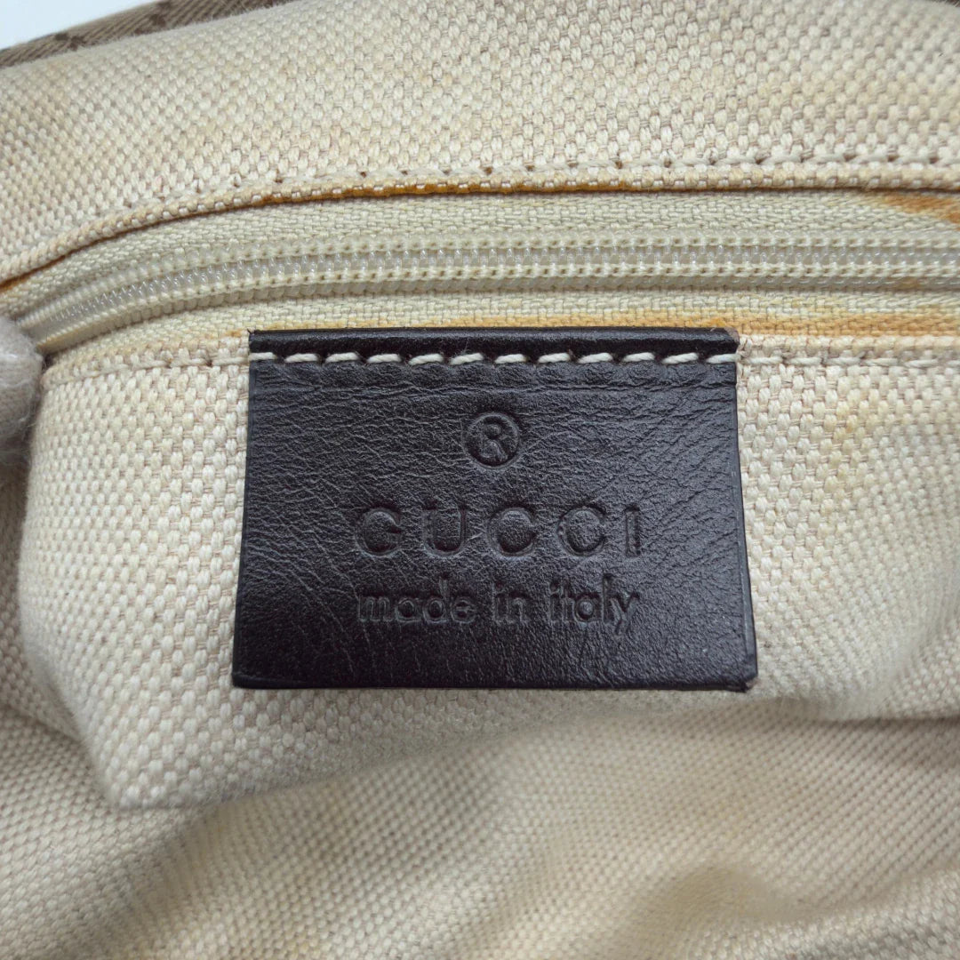 https://cdn.shopify.com/s/files/1/0564/9376/8855/files/Gucci_Schultertasche_Sukey_One_monogram_beige_13.webp?v=1781856423