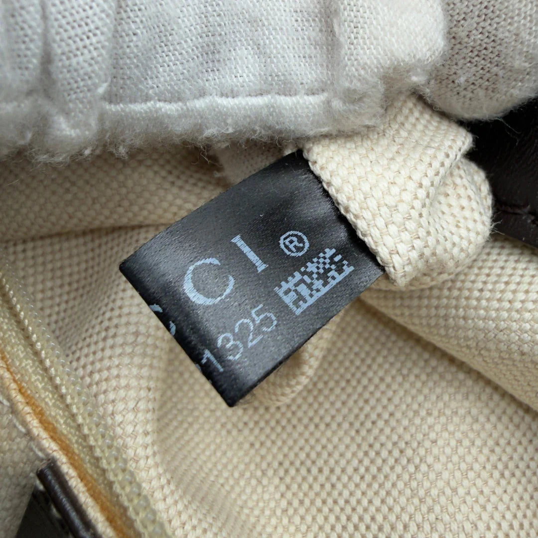 https://cdn.shopify.com/s/files/1/0564/9376/8855/files/Gucci_Schultertasche_Sukey_One_monogram_beige_16.webp?v=1781856423