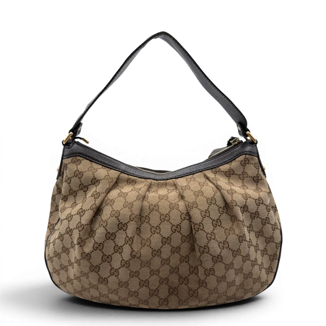 https://cdn.shopify.com/s/files/1/0564/9376/8855/files/Gucci_Schultertasche_Sukey_One_monogram_beige_2_1e4d2aac-333d-4812-a4c6-4d9d174dfacb.webp?v=1782906748