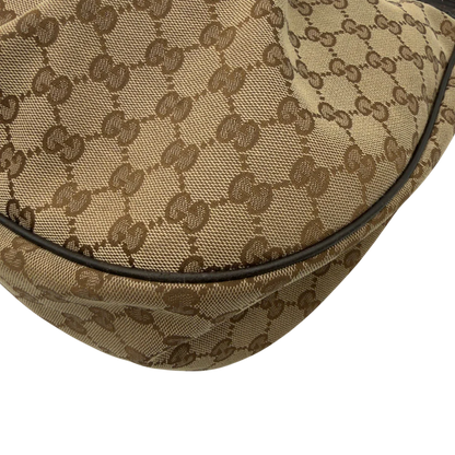 https://cdn.shopify.com/s/files/1/0564/9376/8855/files/Gucci_Schultertasche_Sukey_One_monogram_beige_5_37322a8e-8478-4db1-8141-6d645f41dbac.webp?v=1782384654