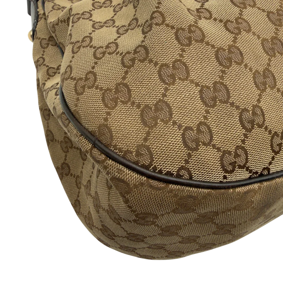 https://cdn.shopify.com/s/files/1/0564/9376/8855/files/Gucci_Schultertasche_Sukey_One_monogram_beige_7_26769fc7-e144-4e65-853a-48fbbdd53fec.webp?v=1782906749