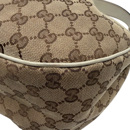 https://cdn.shopify.com/s/files/1/0564/9376/8855/files/Gucci_Schultertasche_Sukey_One_monogram_beige_8_0b042a50-5f75-4555-99fd-9c6459e5c975.webp?v=1782908526