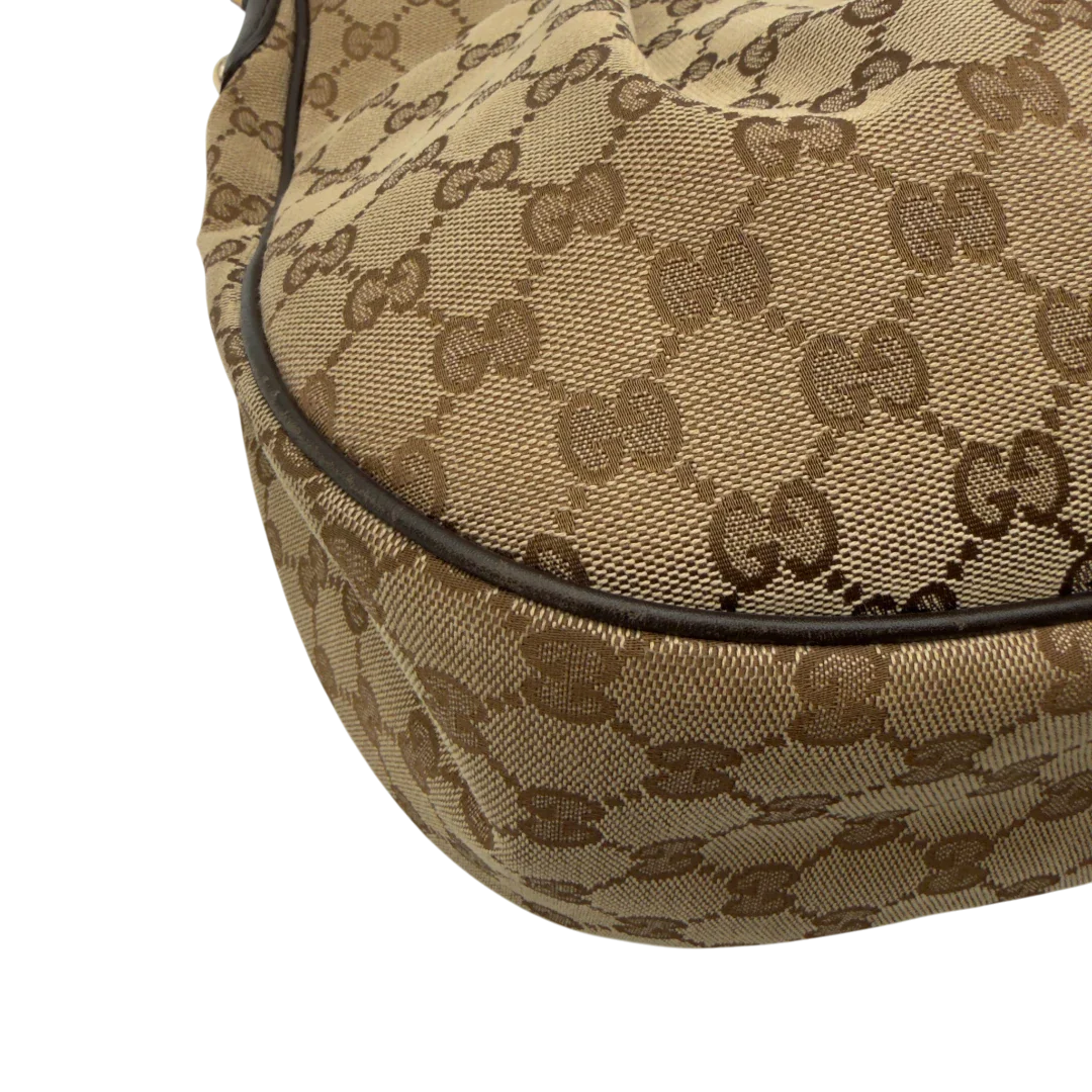 https://cdn.shopify.com/s/files/1/0564/9376/8855/files/Gucci_Schultertasche_Sukey_One_monogram_beige_8_aad722ab-9b30-4d51-a155-f17d716ae24a.webp?v=1782384654