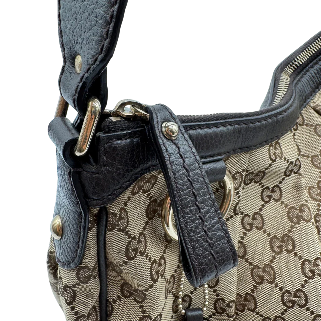 https://cdn.shopify.com/s/files/1/0564/9376/8855/files/Gucci_Schultertasche_Sukey_One_monogram_braun_12_ce04262e-2304-4d01-8fbf-eddacef16471.webp?v=1783514604