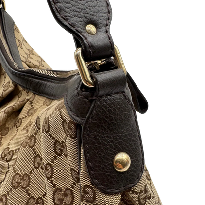 https://cdn.shopify.com/s/files/1/0564/9376/8855/files/Gucci_Schultertasche_Sukey_One_monogram_braun_14_56b32488-02c0-46c7-9cc0-6833267b45ae.webp?v=1783514604