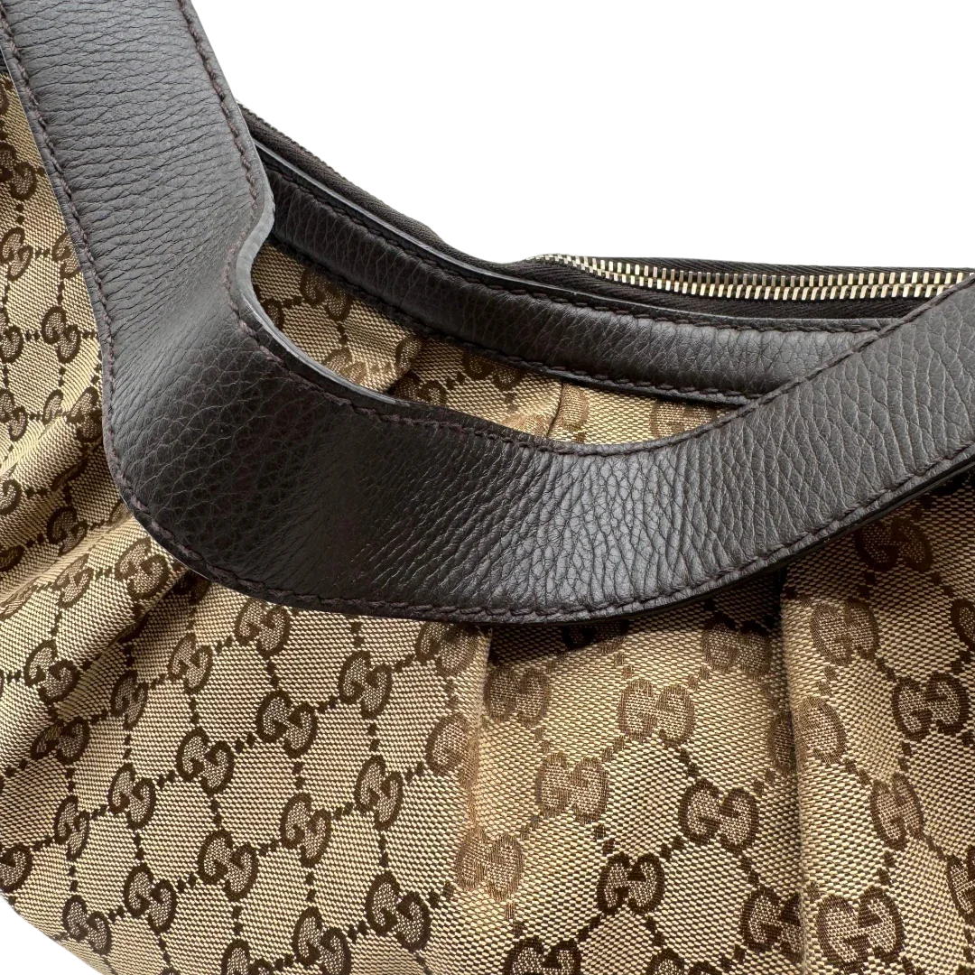 https://cdn.shopify.com/s/files/1/0564/9376/8855/files/Gucci_Schultertasche_Sukey_One_monogram_braun_15_d52cf39a-c323-4503-aff8-c70d49b6c98d.webp?v=1783514604