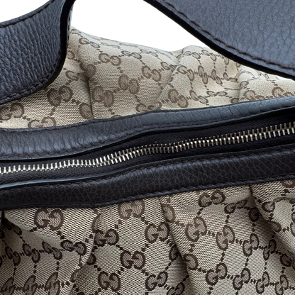 https://cdn.shopify.com/s/files/1/0564/9376/8855/files/Gucci_Schultertasche_Sukey_One_monogram_braun_16.webp?v=1783514604