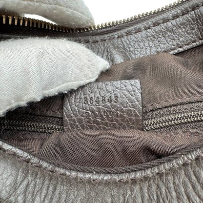 https://cdn.shopify.com/s/files/1/0564/9376/8855/files/Gucci_Schultertasche_Sukey_One_monogram_braun_20.webp?v=1783514604