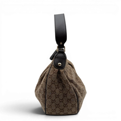 https://cdn.shopify.com/s/files/1/0564/9376/8855/files/Gucci_Schultertasche_Sukey_One_monogram_braun_3.webp?v=1782905168