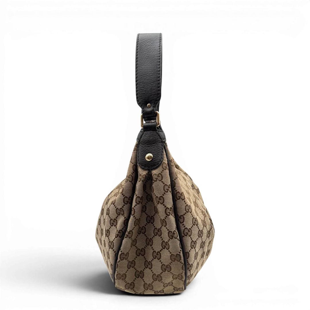 https://cdn.shopify.com/s/files/1/0564/9376/8855/files/Gucci_Schultertasche_Sukey_One_monogram_braun_3_e8741c7a-52af-4191-b6ff-3629e3b04a24.webp?v=1783514603
