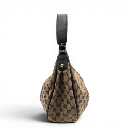 https://cdn.shopify.com/s/files/1/0564/9376/8855/files/Gucci_Schultertasche_Sukey_One_monogram_braun_3_e8741c7a-52af-4191-b6ff-3629e3b04a24.webp?v=1783514603