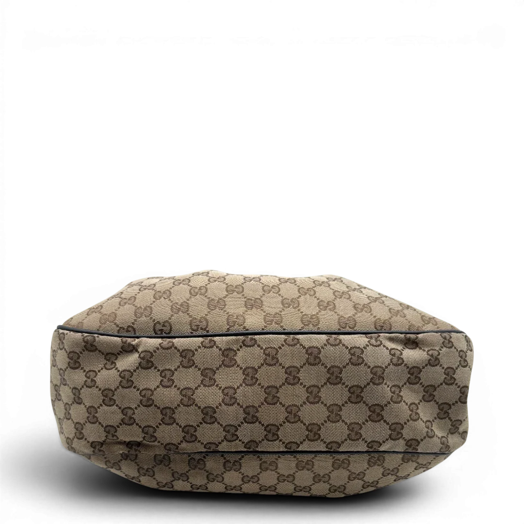 https://cdn.shopify.com/s/files/1/0564/9376/8855/files/Gucci_Schultertasche_Sukey_One_monogram_braun_5_7117854a-11bf-4e5b-973e-c1faee5eda54.webp?v=1783514603