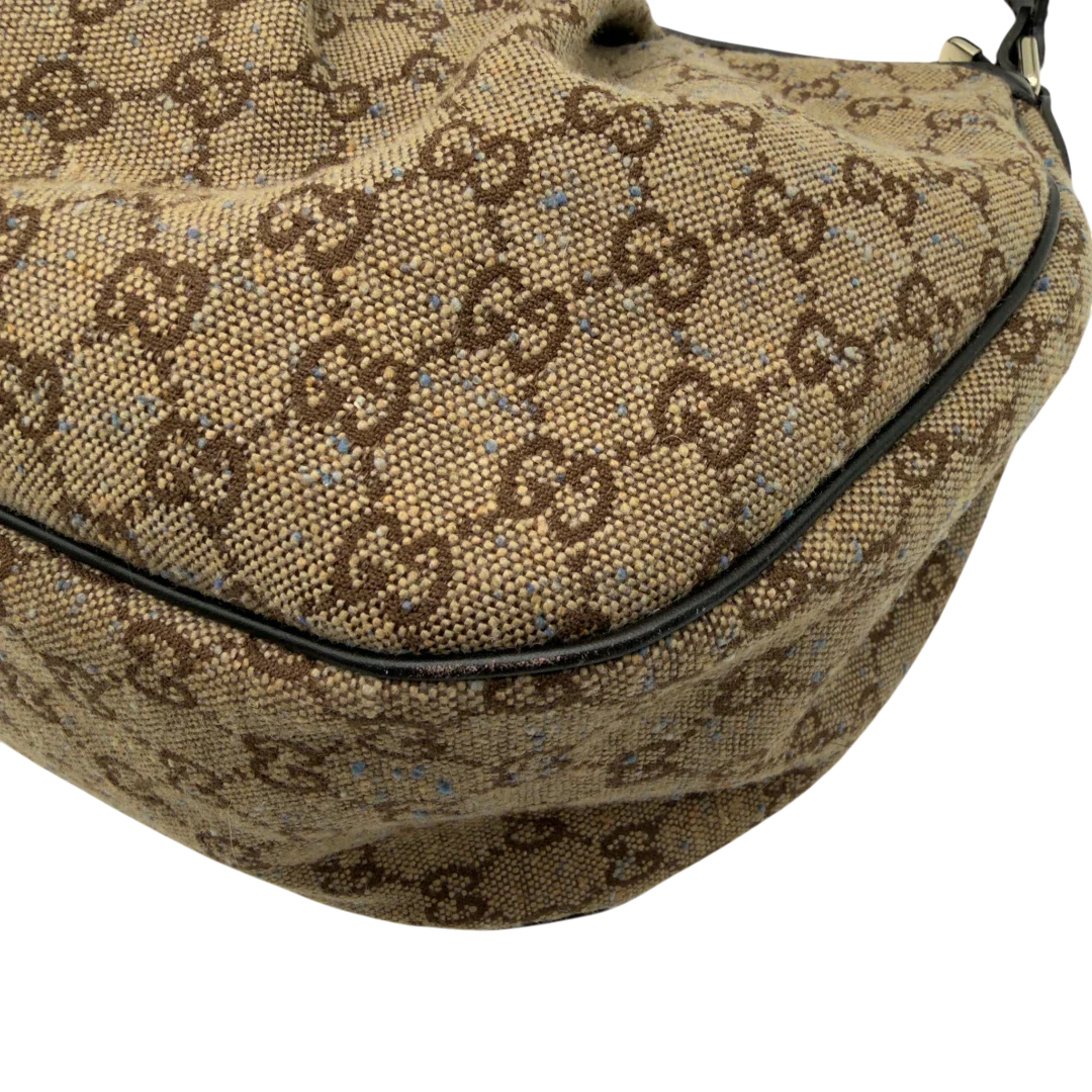 https://cdn.shopify.com/s/files/1/0564/9376/8855/files/Gucci_Schultertasche_Sukey_One_monogram_braun_6.webp?v=1782905169