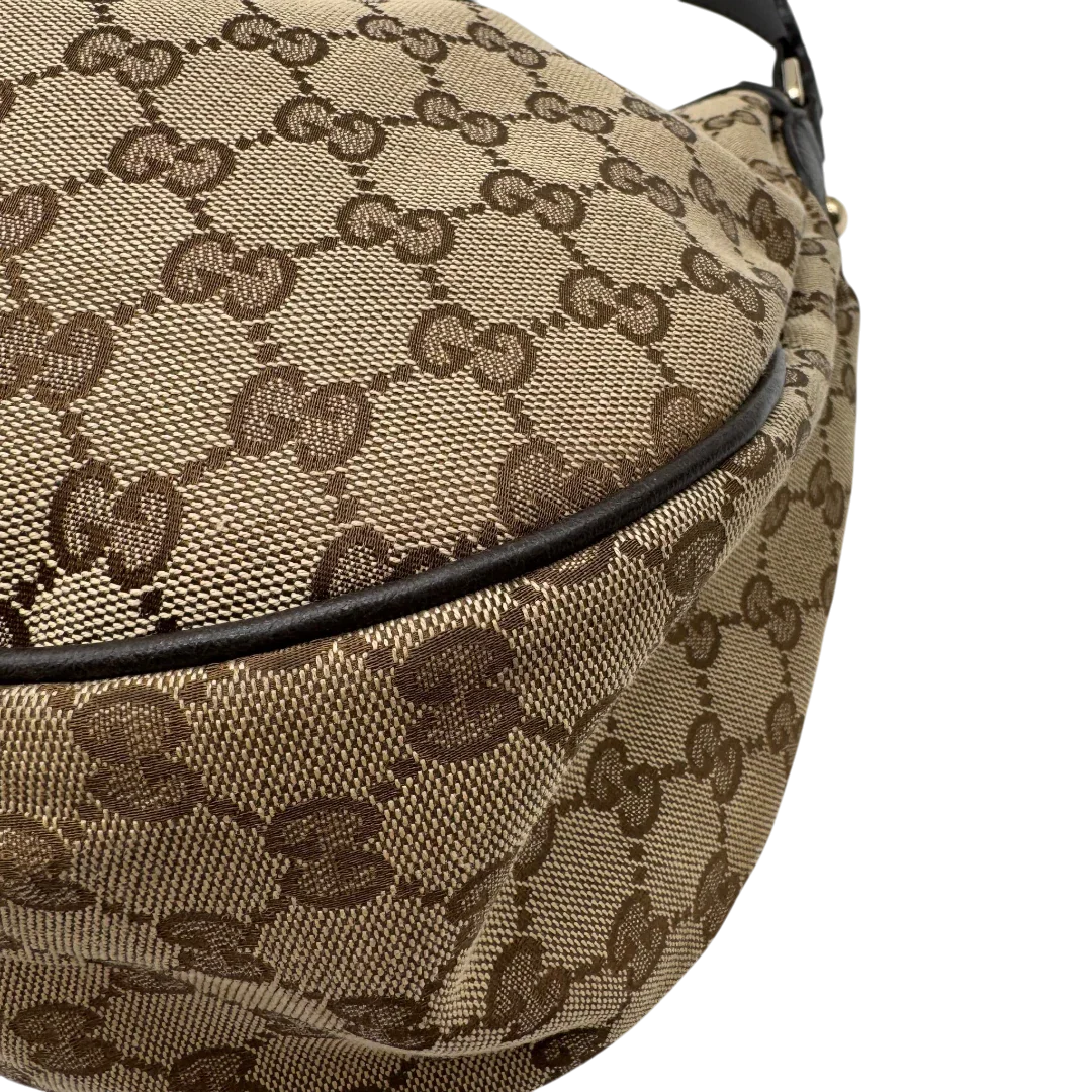 https://cdn.shopify.com/s/files/1/0564/9376/8855/files/Gucci_Schultertasche_Sukey_One_monogram_braun_7_af400a93-35b6-4482-914e-4debe93da011.webp?v=1783514604