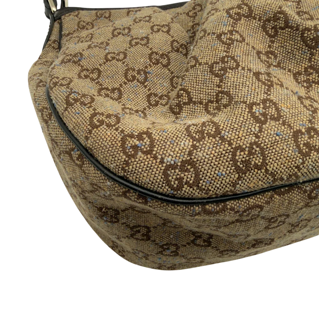 https://cdn.shopify.com/s/files/1/0564/9376/8855/files/Gucci_Schultertasche_Sukey_One_monogram_braun_9.webp?v=1782905169