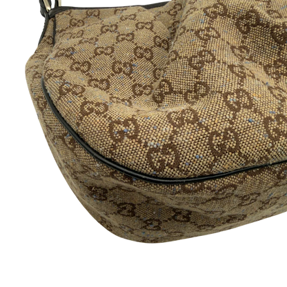 https://cdn.shopify.com/s/files/1/0564/9376/8855/files/Gucci_Schultertasche_Sukey_One_monogram_braun_9.webp?v=1782905169