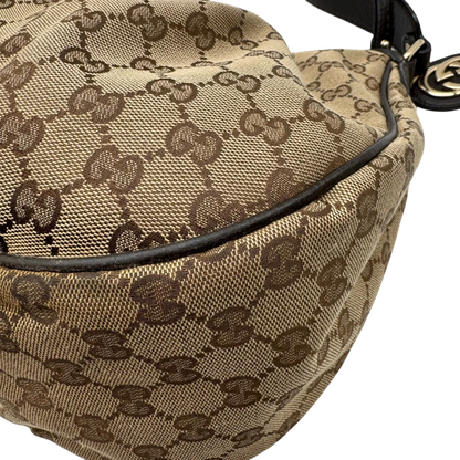 https://cdn.shopify.com/s/files/1/0564/9376/8855/files/Gucci_Schultertasche_Sukey_One_monogram_braun_9_db59db1e-f5f6-4fdd-9603-bfa8c42a5555.webp?v=1783514605