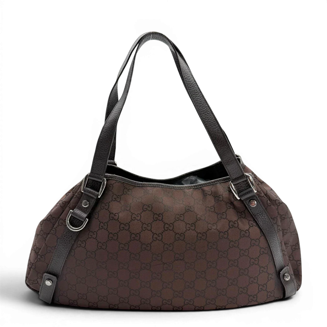 https://cdn.shopify.com/s/files/1/0564/9376/8855/files/Gucci_Shopper_Abbey_aus_Nylon_monogram_dunkelbraun_vintage_GG6402.webp?v=1778682921