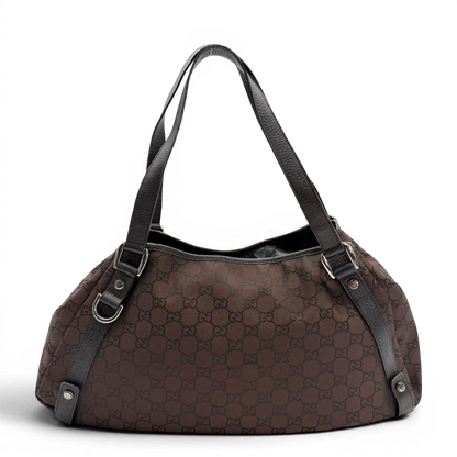 https://cdn.shopify.com/s/files/1/0564/9376/8855/files/Gucci_Shopper_Abbey_aus_Nylon_monogram_dunkelbraun_vintage_GG6402.webp?v=1778682921