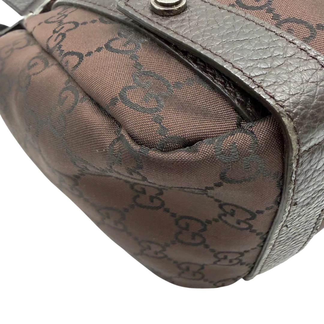 https://cdn.shopify.com/s/files/1/0564/9376/8855/files/Gucci_Shopper_Abbey_aus_Nylon_monogram_dunkelbraun_vintage_GG6408.webp?v=1778682921