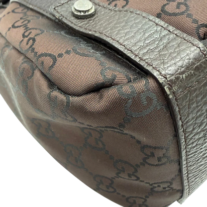 https://cdn.shopify.com/s/files/1/0564/9376/8855/files/Gucci_Shopper_Abbey_aus_Nylon_monogram_dunkelbraun_vintage_GG6412.webp?v=1778682922