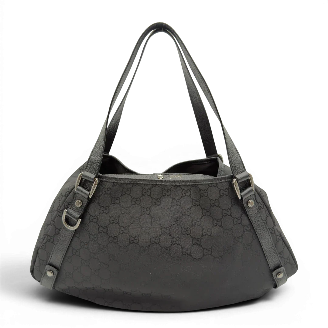 https://cdn.shopify.com/s/files/1/0564/9376/8855/files/Gucci_Shopper_Abbey_aus_Nylon_monogram_schwarz_1.webp?v=1782909693