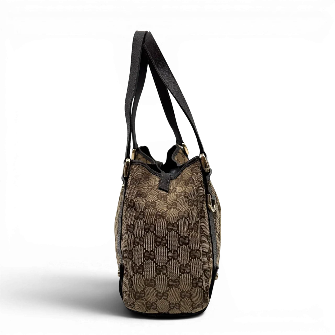 https://cdn.shopify.com/s/files/1/0564/9376/8855/files/Gucci_Shopper_Abbey_monogram_beige_vintage_GG2084.webp?v=1779963257