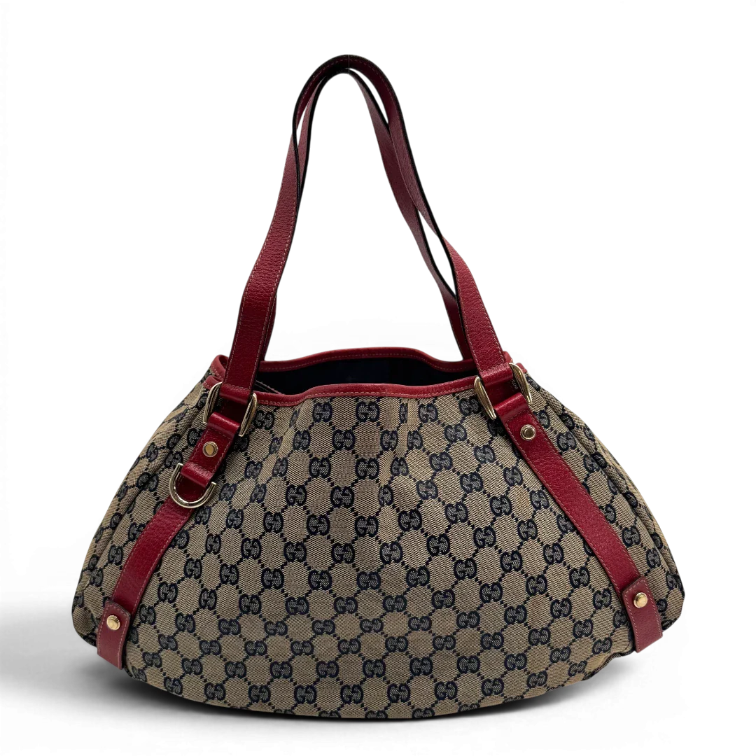 https://cdn.shopify.com/s/files/1/0564/9376/8855/files/Gucci_Shopper_Abbey_monogram_beige_vintage_GG2306.webp?v=1779966616