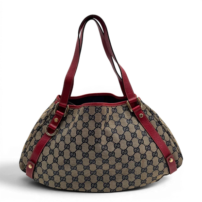 https://cdn.shopify.com/s/files/1/0564/9376/8855/files/Gucci_Shopper_Abbey_monogram_beige_vintage_GG2306.webp?v=1779966616