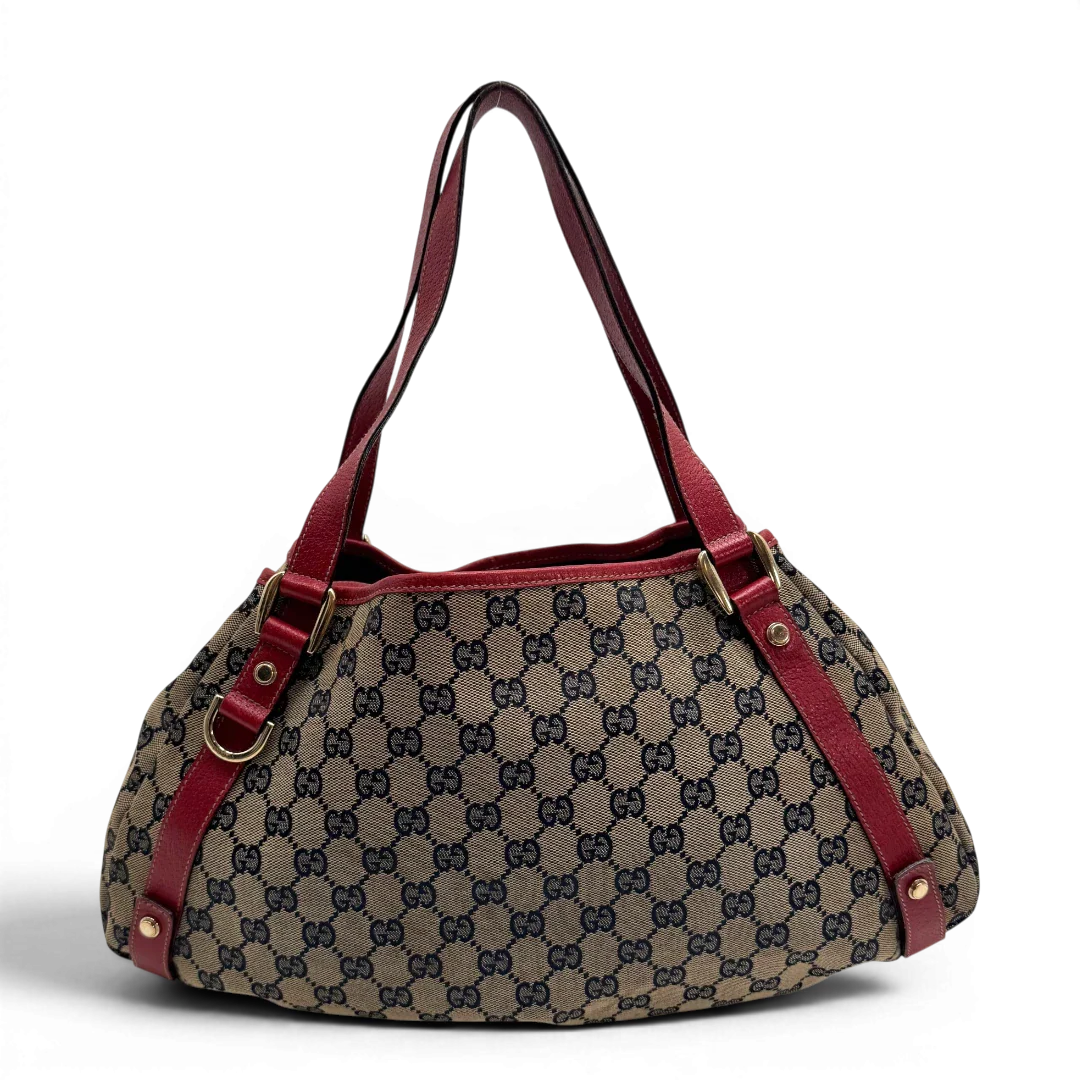 https://cdn.shopify.com/s/files/1/0564/9376/8855/files/Gucci_Shopper_Abbey_monogram_beige_vintage_GG2309.webp?v=1779966617