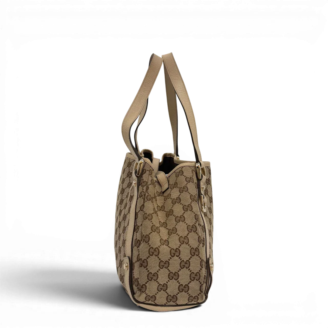 https://cdn.shopify.com/s/files/1/0564/9376/8855/files/Gucci_Shopper_Abbey_monogram_beige_vintage_GG6938.webp?v=1779320215