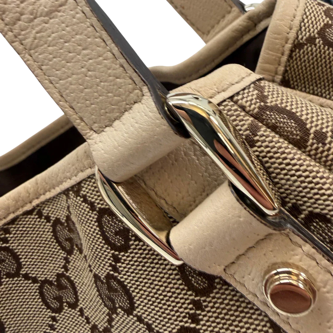 https://cdn.shopify.com/s/files/1/0564/9376/8855/files/Gucci_Shopper_Abbey_monogram_beige_vintage_GG6946.webp?v=1779320215