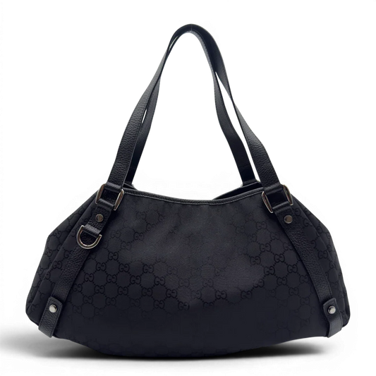 https://cdn.shopify.com/s/files/1/0564/9376/8855/files/Gucci_Shopper_Abbey_monogram_schwarz_vintage_GG7006.webp?v=1778080747