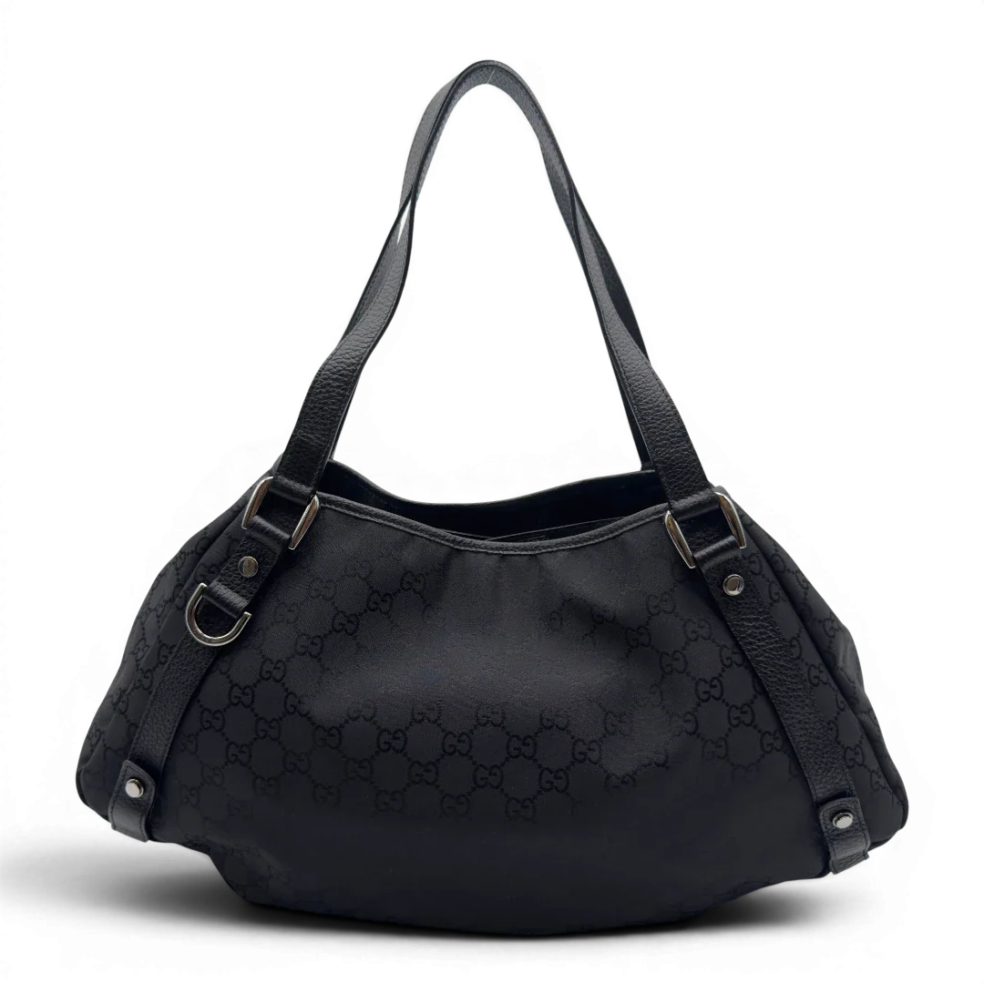 https://cdn.shopify.com/s/files/1/0564/9376/8855/files/Gucci_Shopper_Abbey_monogram_schwarz_vintage_GG7007.webp?v=1778080748