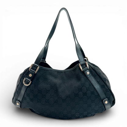 https://cdn.shopify.com/s/files/1/0564/9376/8855/files/Gucci_Shopper_Abbey_monogram_schwarz_vintage_GG_2219.webp?v=1772717157