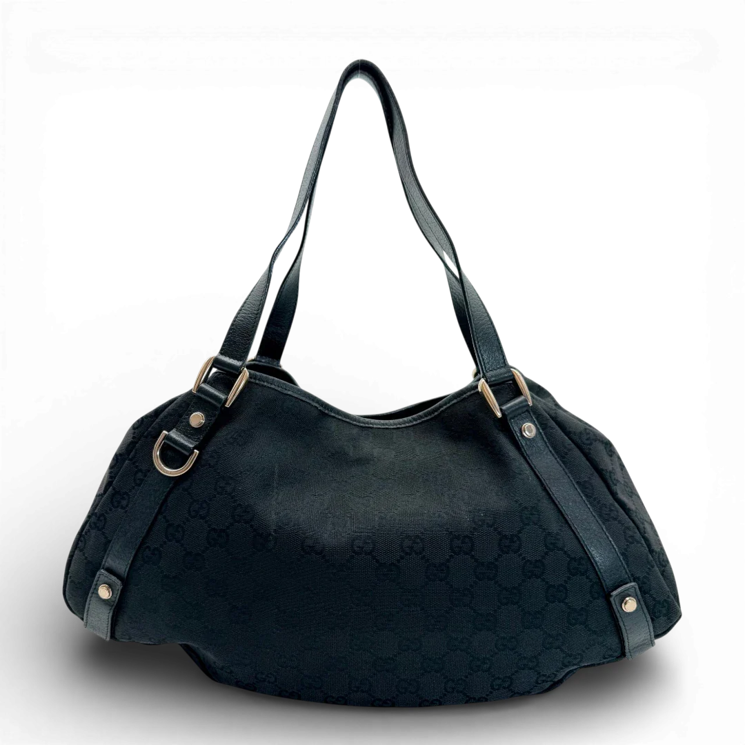 https://cdn.shopify.com/s/files/1/0564/9376/8855/files/Gucci_Shopper_Abbey_monogram_schwarz_vintage_GG_2220.webp?v=1772717193