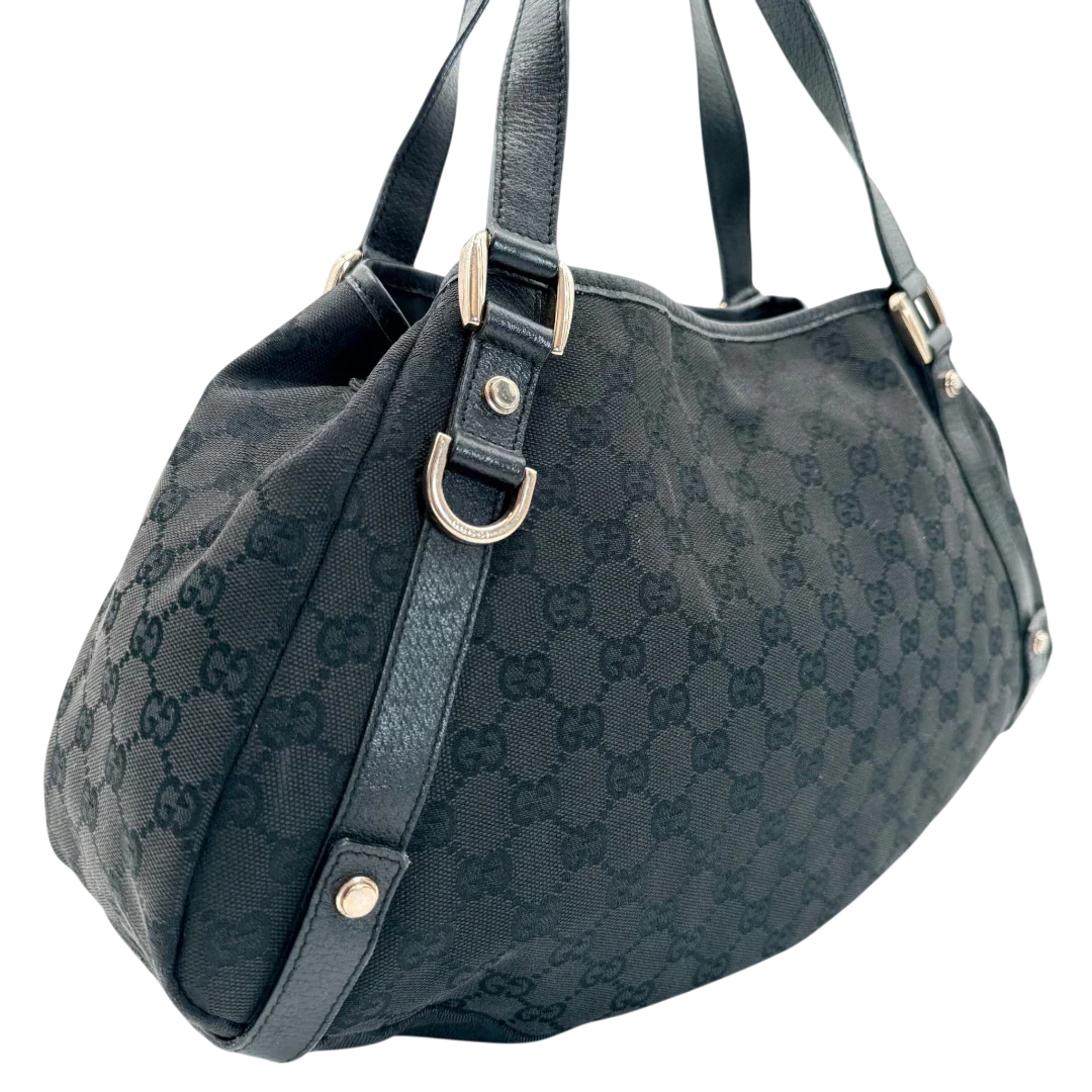 https://cdn.shopify.com/s/files/1/0564/9376/8855/files/Gucci_Shopper_Abbey_monogram_schwarz_vintage_GG_2230.webp?v=1772717193