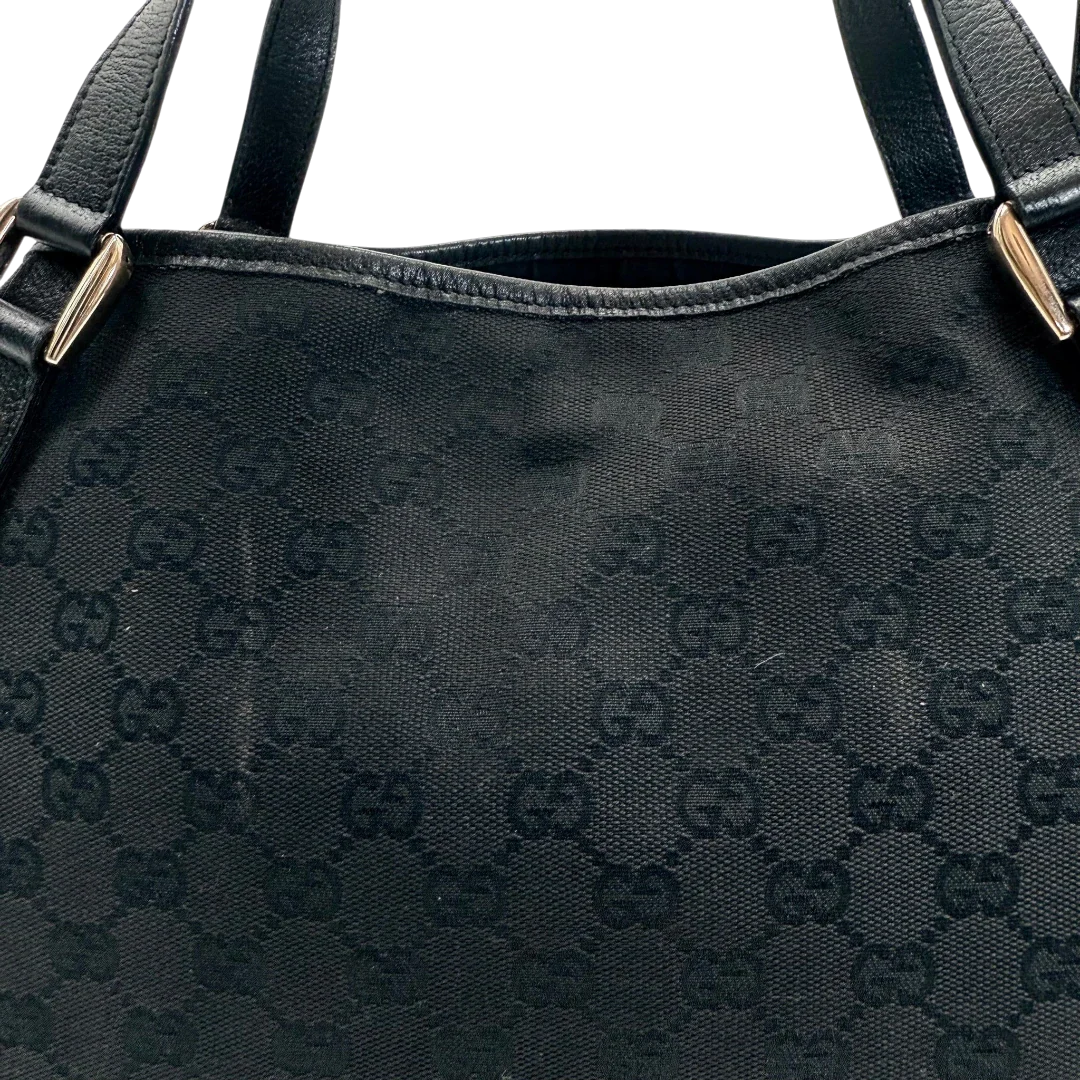 https://cdn.shopify.com/s/files/1/0564/9376/8855/files/Gucci_Shopper_Abbey_monogram_schwarz_vintage_GG_2231.webp?v=1772717193