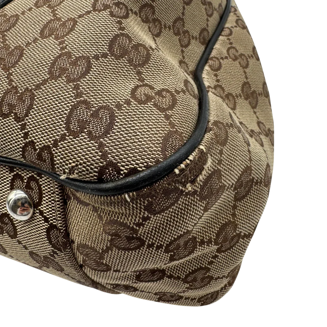https://cdn.shopify.com/s/files/1/0564/9376/8855/files/Gucci_Shopper_GG_Twins_monogram_beige_9.webp?v=1781107269
