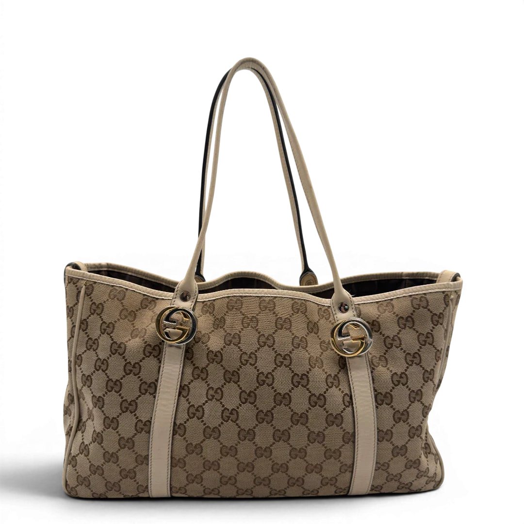 https://cdn.shopify.com/s/files/1/0564/9376/8855/files/Gucci_Shopper_GG_Twins_monogram_beige_vintage_GG7277.webp?v=1778680608