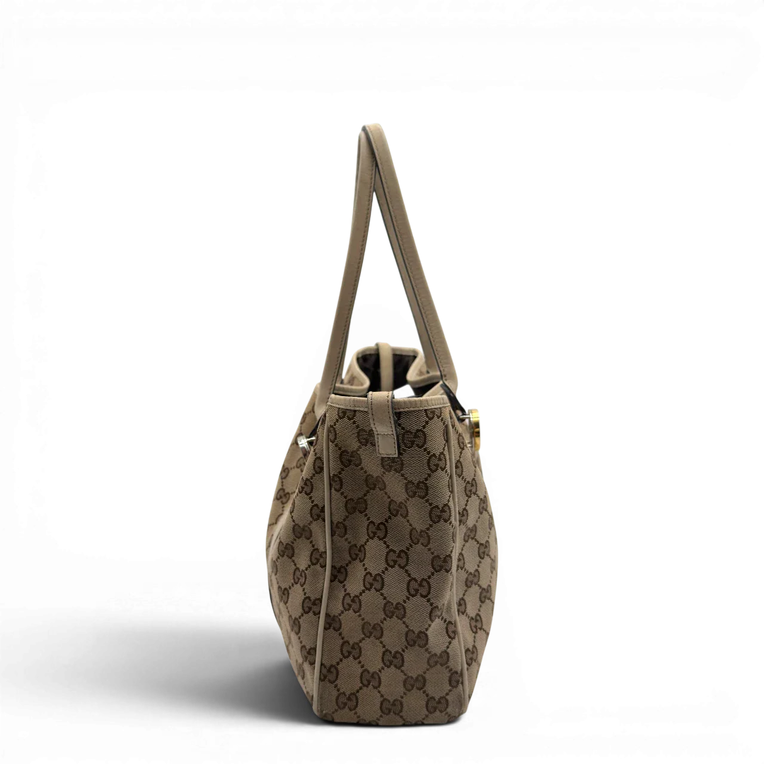 https://cdn.shopify.com/s/files/1/0564/9376/8855/files/Gucci_Shopper_GG_Twins_monogram_beige_vintage_GG7280.webp?v=1778680607