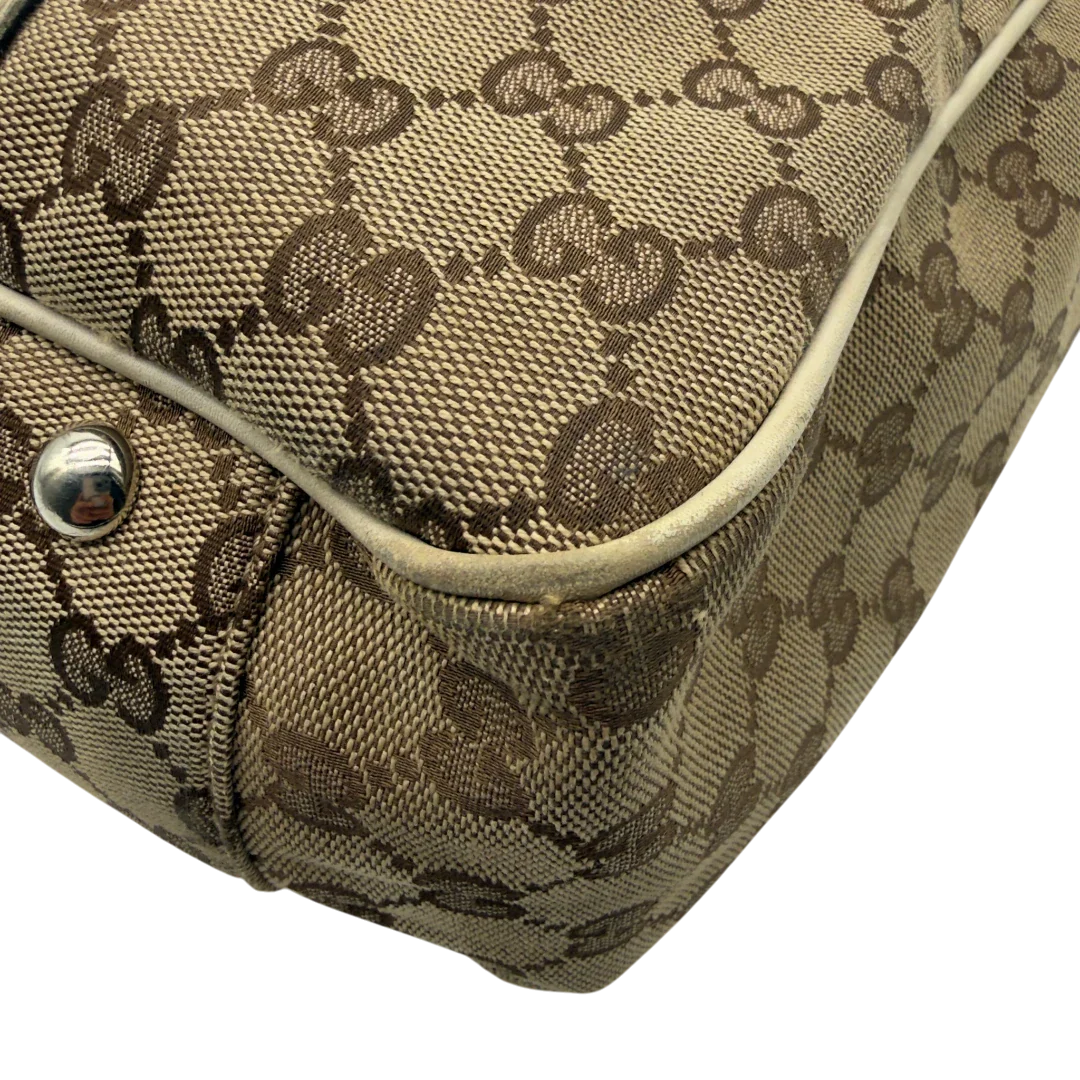 https://cdn.shopify.com/s/files/1/0564/9376/8855/files/Gucci_Shopper_GG_Twins_monogram_beige_vintage_GG7284.webp?v=1778680608
