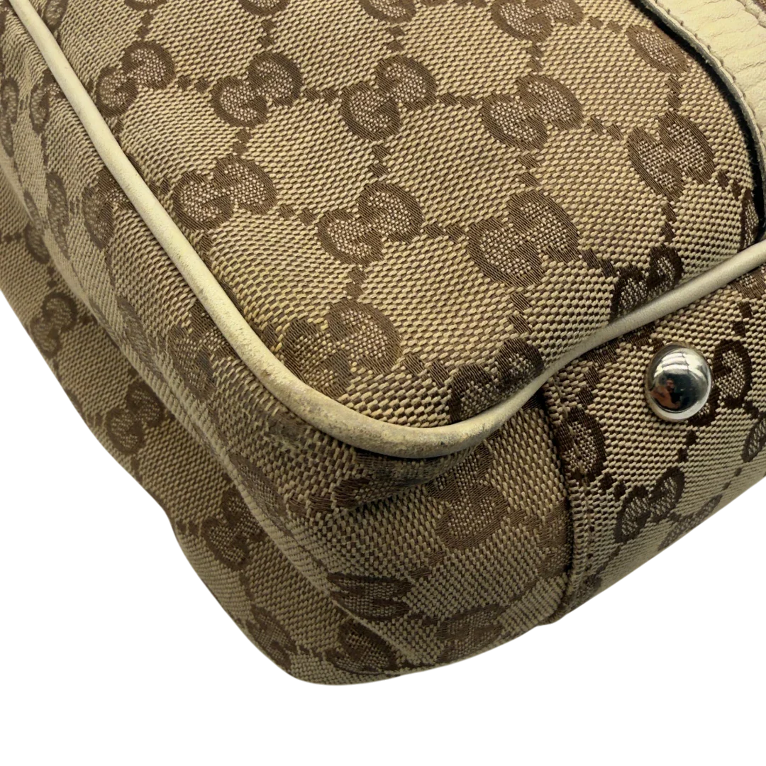 https://cdn.shopify.com/s/files/1/0564/9376/8855/files/Gucci_Shopper_GG_Twins_monogram_beige_vintage_GG7285.webp?v=1778680608