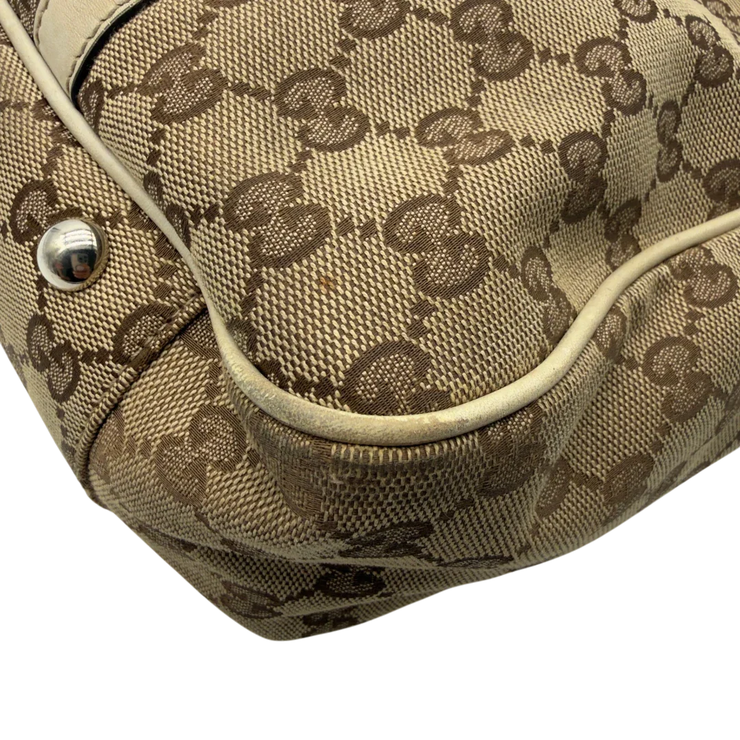 https://cdn.shopify.com/s/files/1/0564/9376/8855/files/Gucci_Shopper_GG_Twins_monogram_beige_vintage_GG7286.webp?v=1778680608