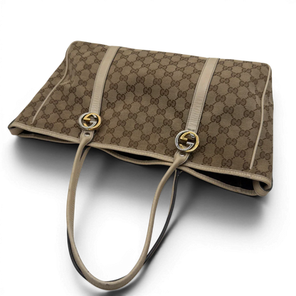 https://cdn.shopify.com/s/files/1/0564/9376/8855/files/Gucci_Shopper_GG_Twins_monogram_beige_vintage_GG7288.webp?v=1778680608
