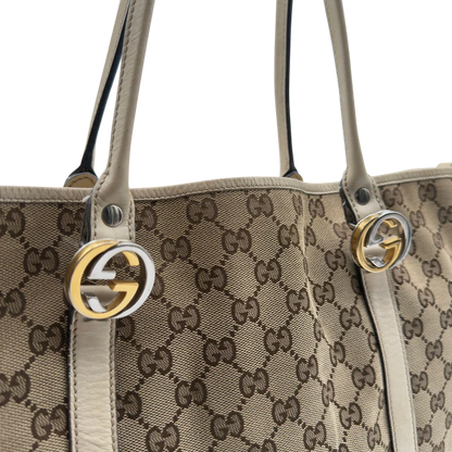 https://cdn.shopify.com/s/files/1/0564/9376/8855/files/Gucci_Shopper_GG_Twins_monogram_beige_vintage_GG7289.webp?v=1778680608