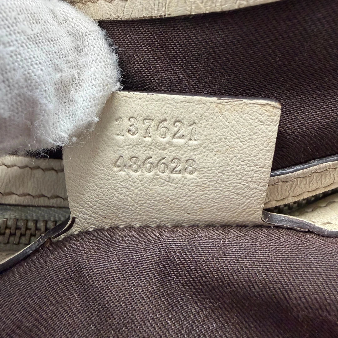 https://cdn.shopify.com/s/files/1/0564/9376/8855/files/Gucci_Shopper_Pelham_monogram_beige_vintage_GG6470.webp?v=1778674888